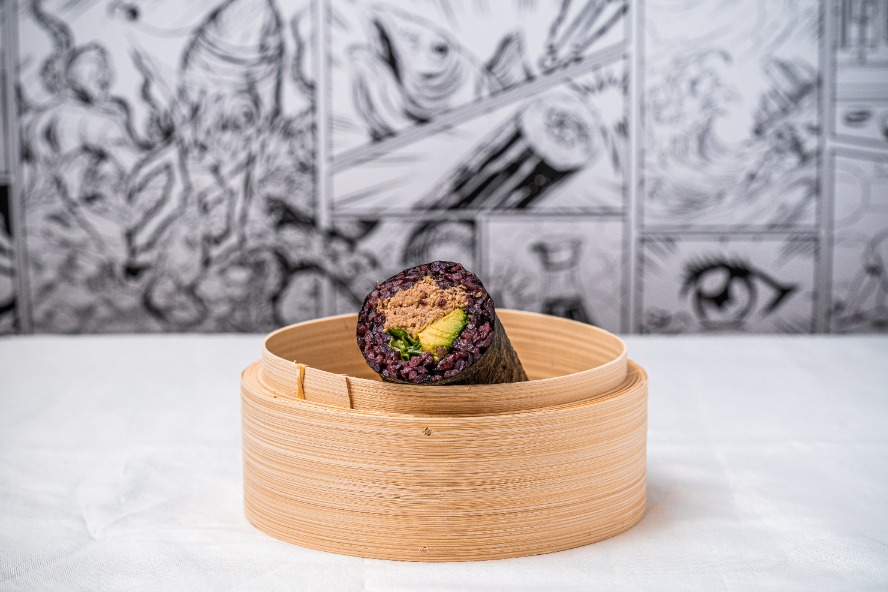 Spicy cooked tuna avocado black rice sushi roll